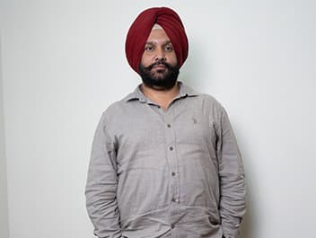 Dr. Arvinder Singh Bali, BAMS, photographed at the clinic