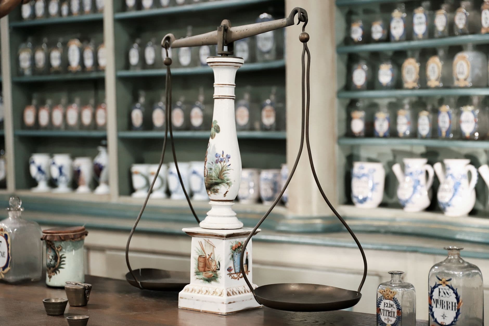 Dried herbs measured on a brass balance